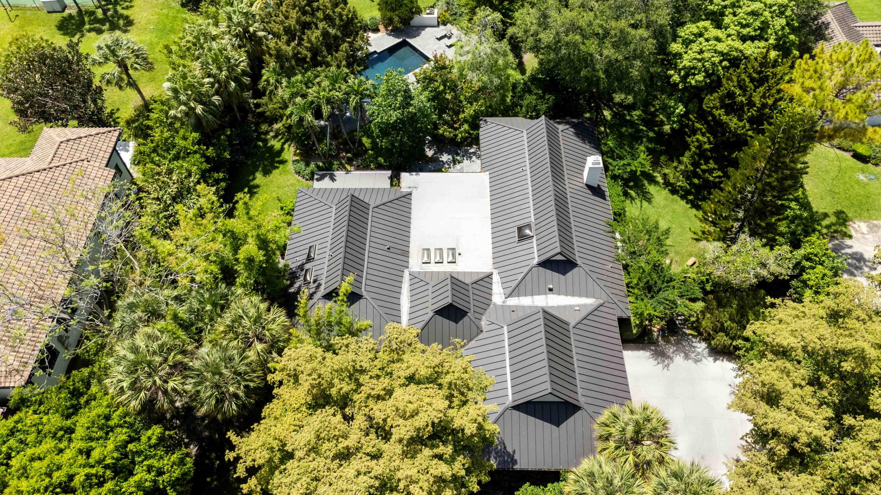 18660 Long Lake Drive Boca Raton, FL 33496 - Photo 58 of 75 an aerial view of residential house with outdoor space and trees all around