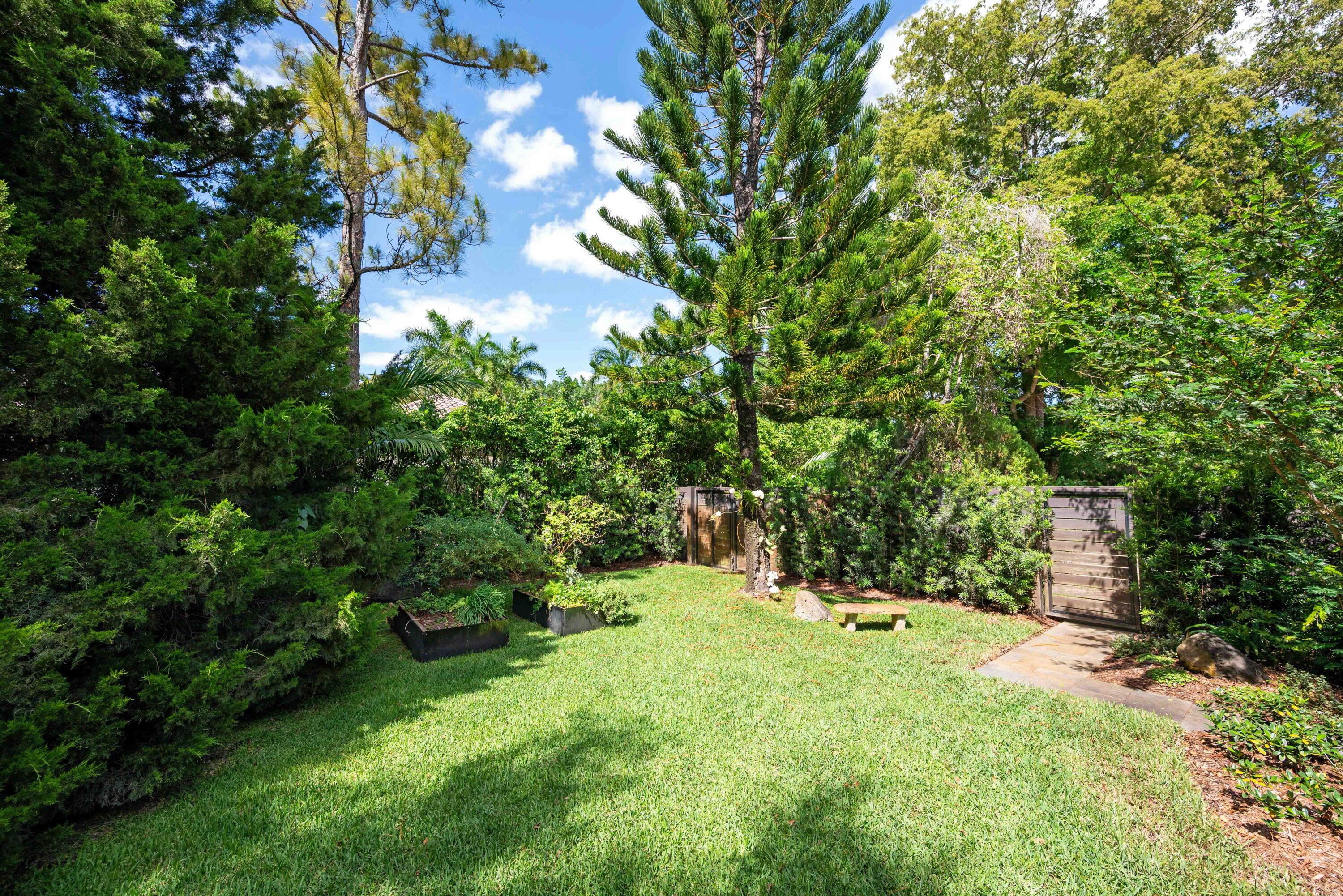 18660 Long Lake Drive Boca Raton, FL 33496 - Photo 65 of 75 a backyard of a house with a tree