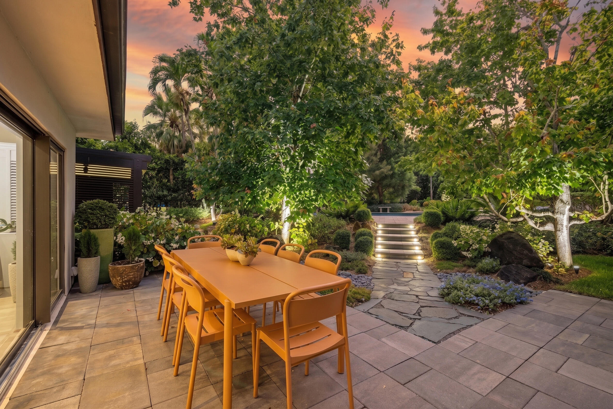 18660 Long Lake Drive Boca Raton, FL 33496 - Photo 66 of 75 a backyard of a house with table and chairs