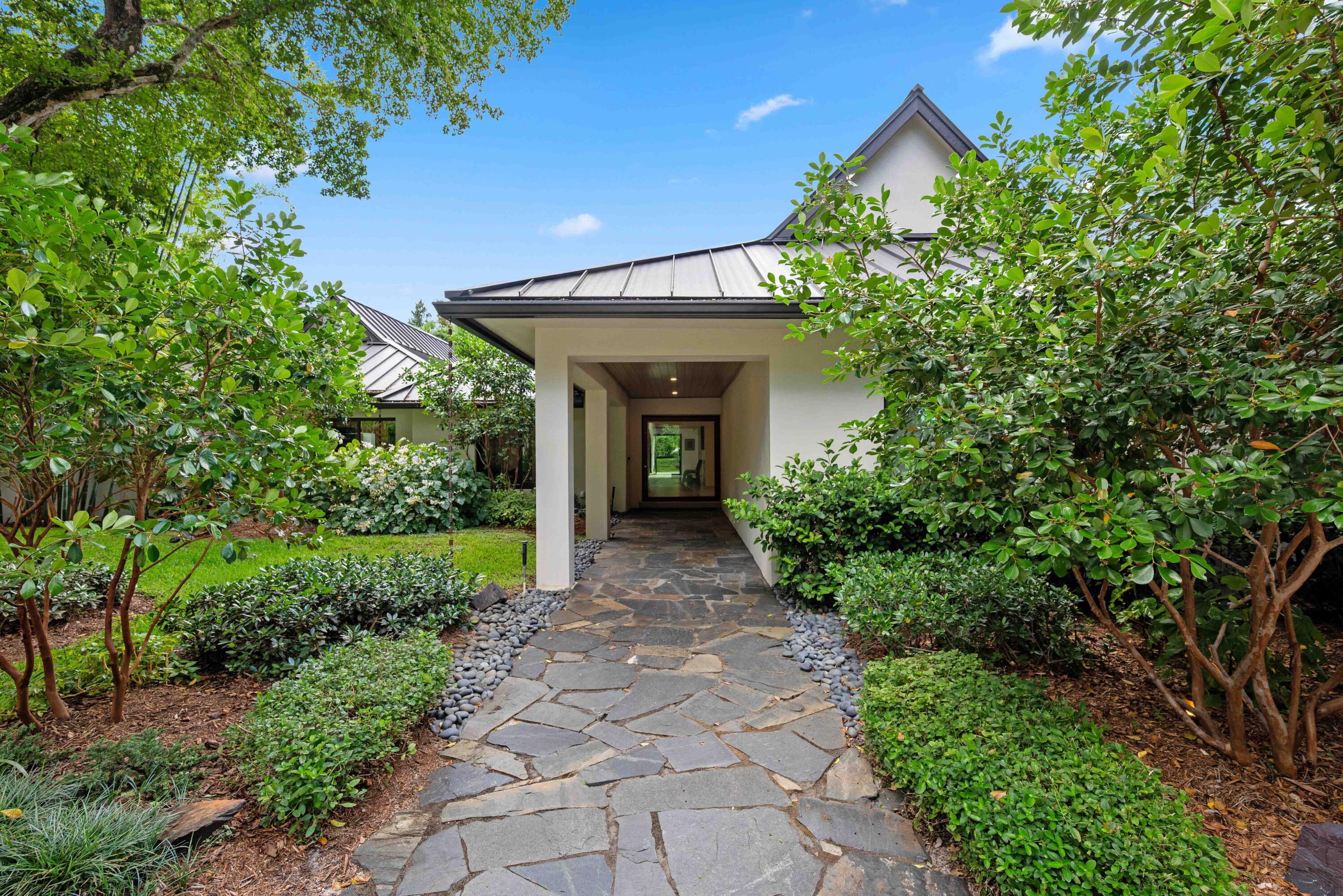 18660 Long Lake Drive Boca Raton, FL 33496 - Photo 7 of 75 a view of a pathway with a house
