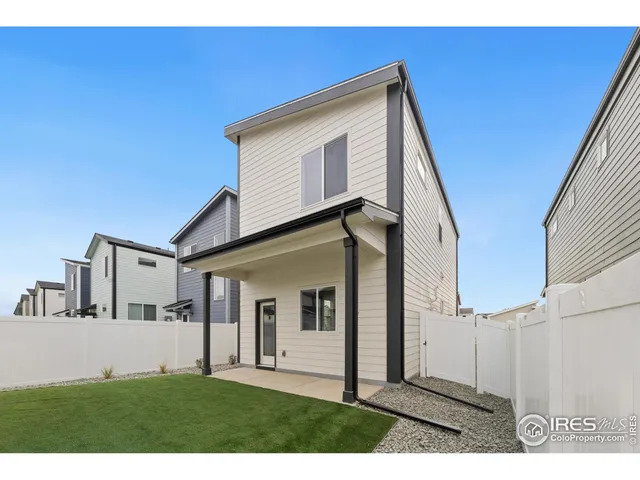 a view of house and yard