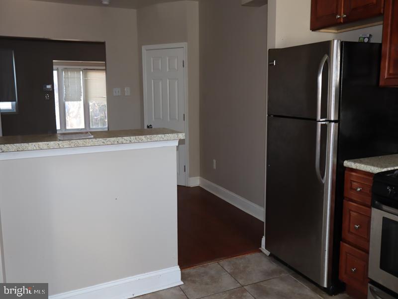 7330 Sommers Road Philadelphia, PA 19138 - Photo 13 of 30 a view of a kitchen with refrigerator and window