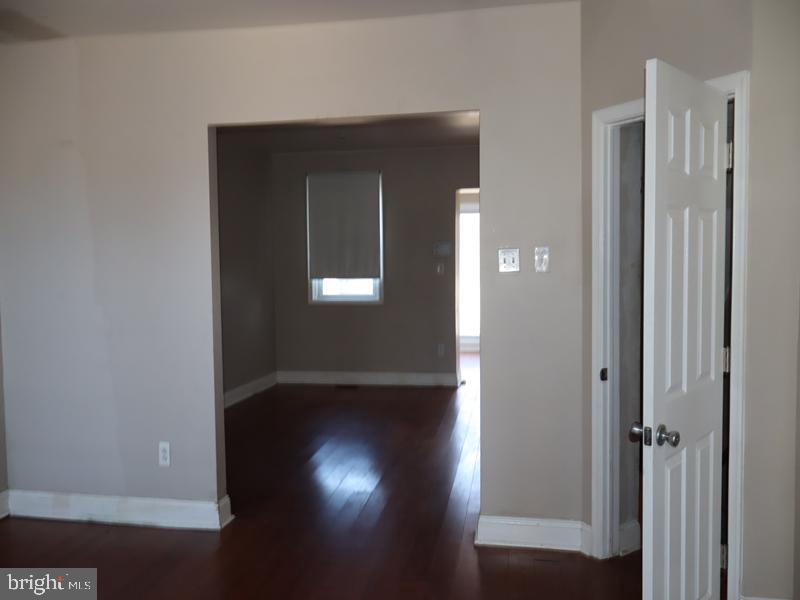 7330 Sommers Road Philadelphia, PA 19138 - Photo 14 of 23 an empty room with wooden floor closet and windows