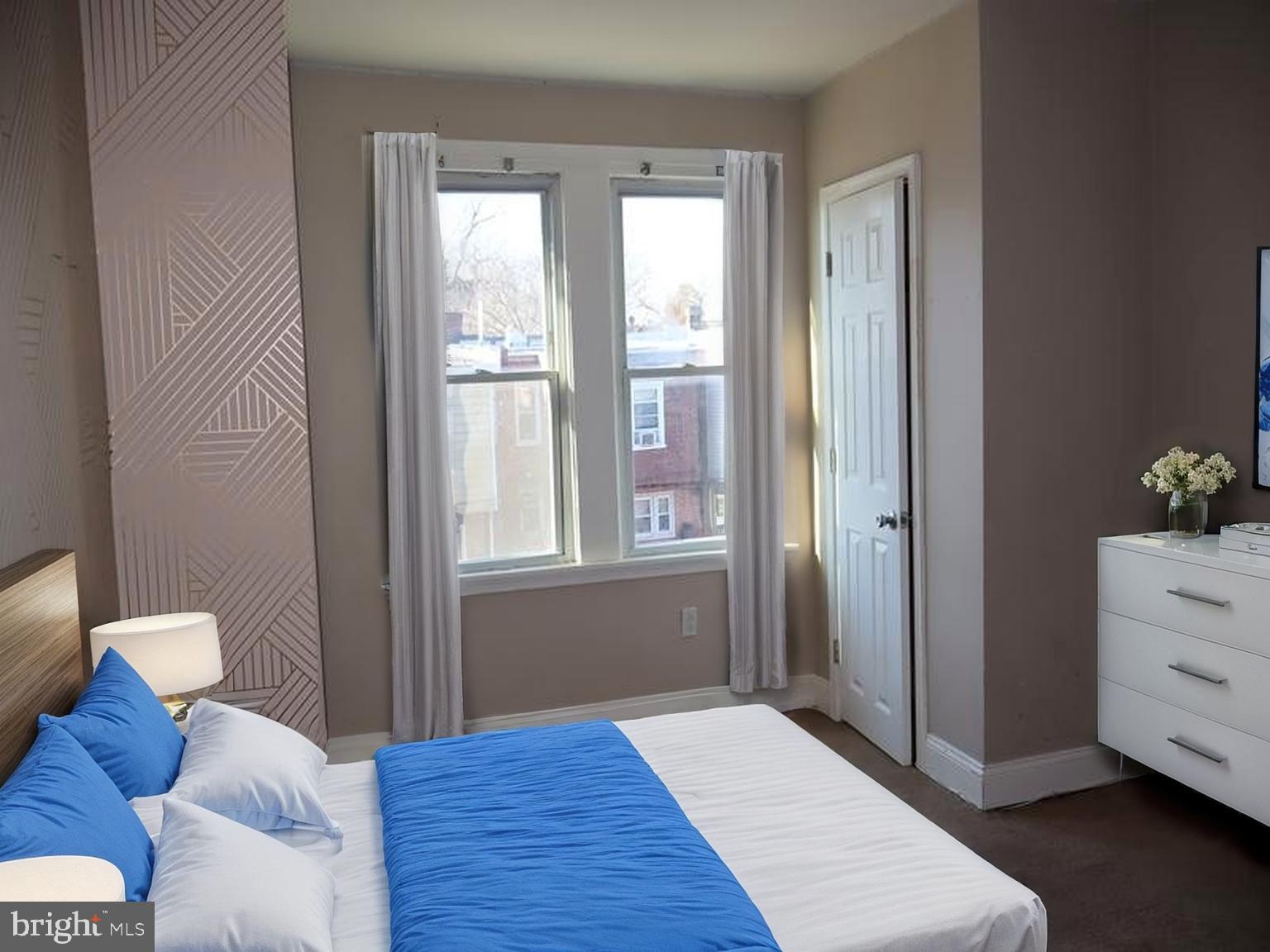 7330 Sommers Road Philadelphia, PA 19138 - Photo 23 of 30 a bedroom with a bed and a window