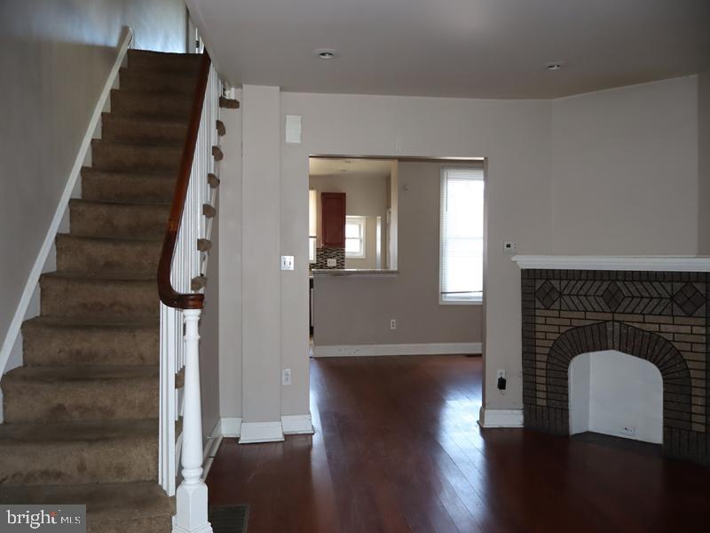 7330 Sommers Road Philadelphia, PA 19138 - Photo 9 of 30 a view of a hallway with wooden floor and staircase