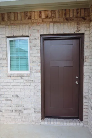 a bathroom with a sink and cabinets