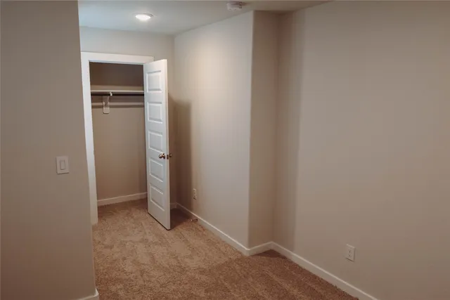a bathroom with a shower and a bath tub