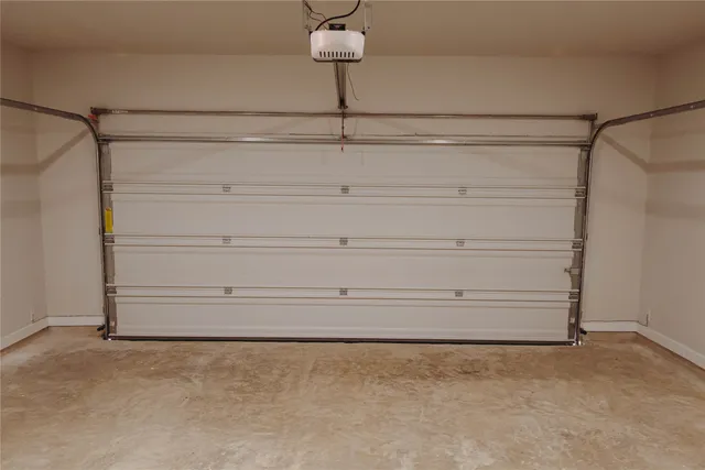 an aerial view of a house with backyard