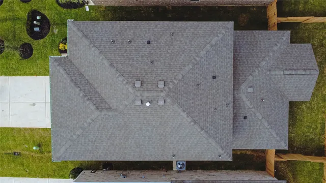 a view of a big yard with a swimming pool