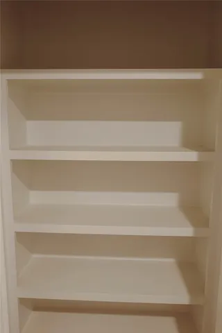 a kitchen with a sink and a window