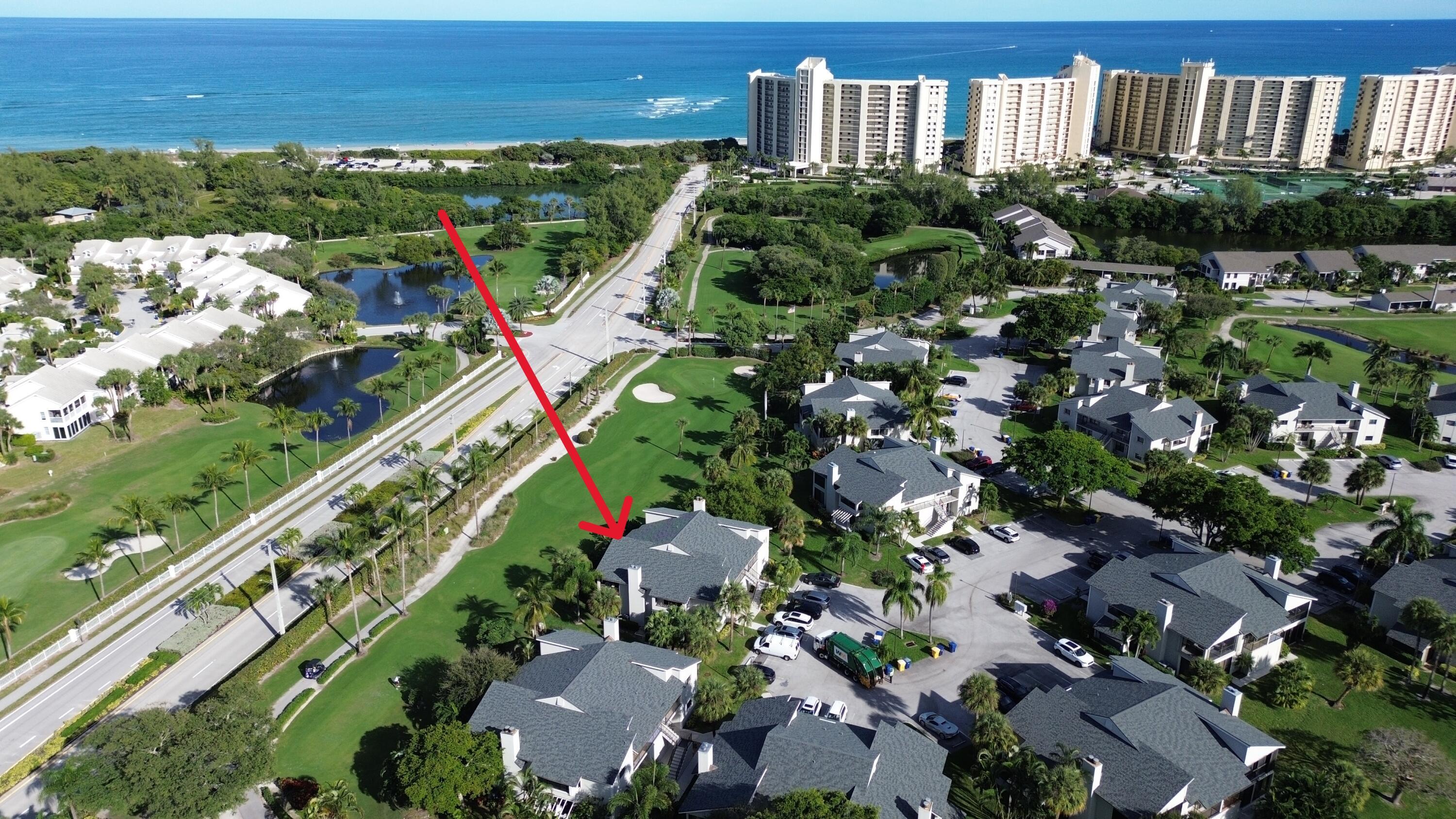 404 Clubhouse Circle Jupiter, FL 33477 - Photo 1 of 20 a view of a city