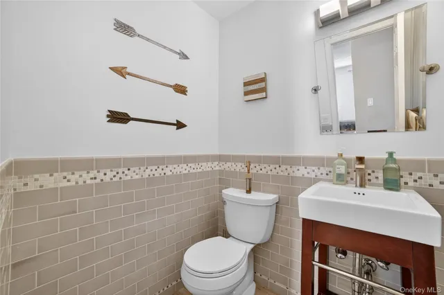 a kitchen with a sink and a stove top oven