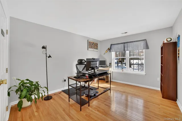 a bedroom with a bed and a table