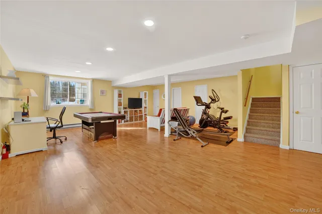 a workspace with furniture and wooden floor