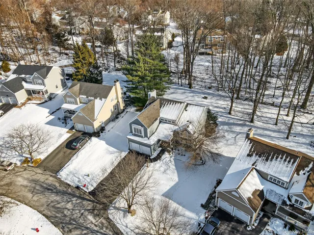 a view of a balcony with chairs