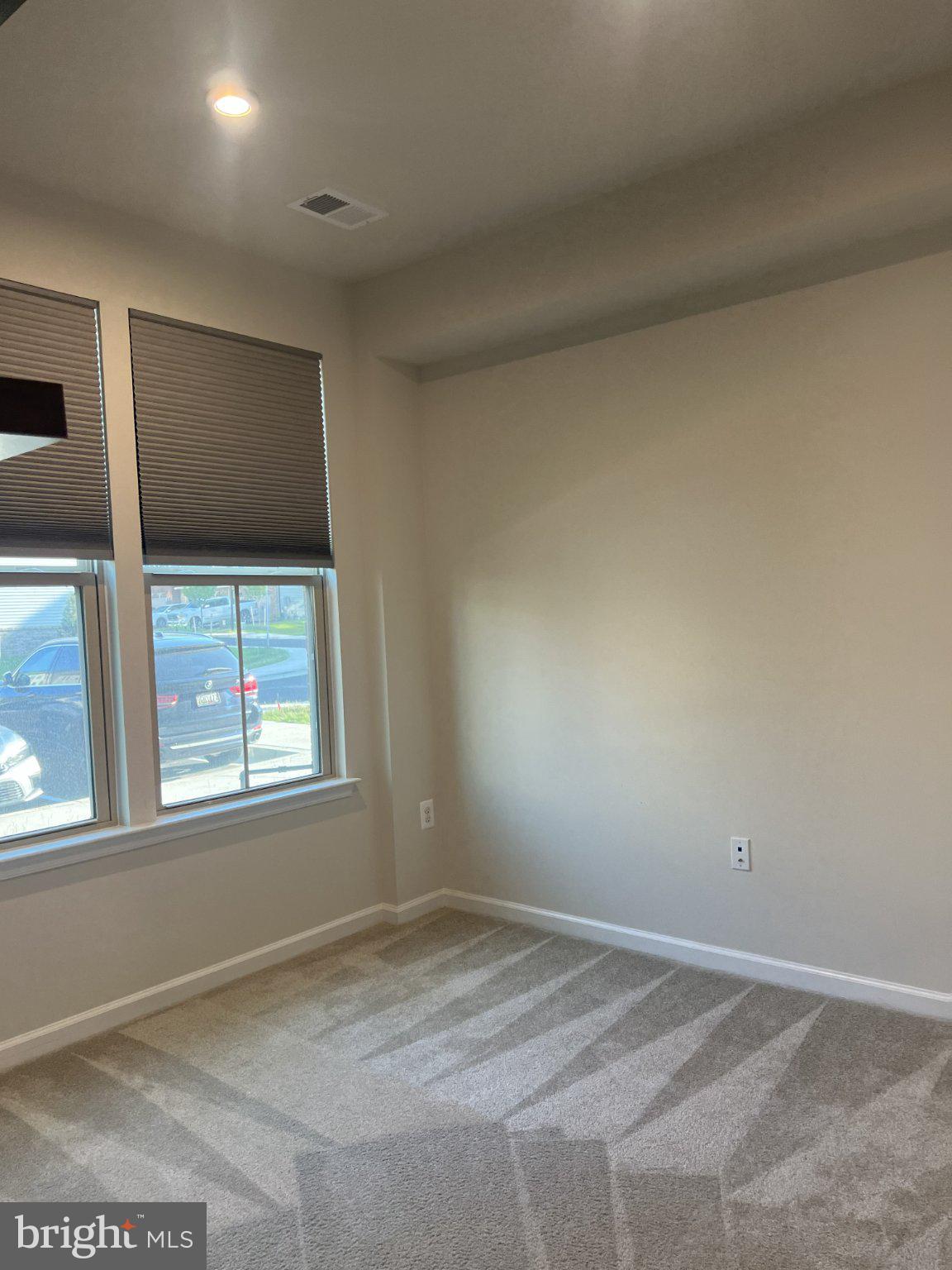 8058 Big Roundtop Road Fort George G Meade, MD 20755 - Photo 5 of 24 an empty room with windows