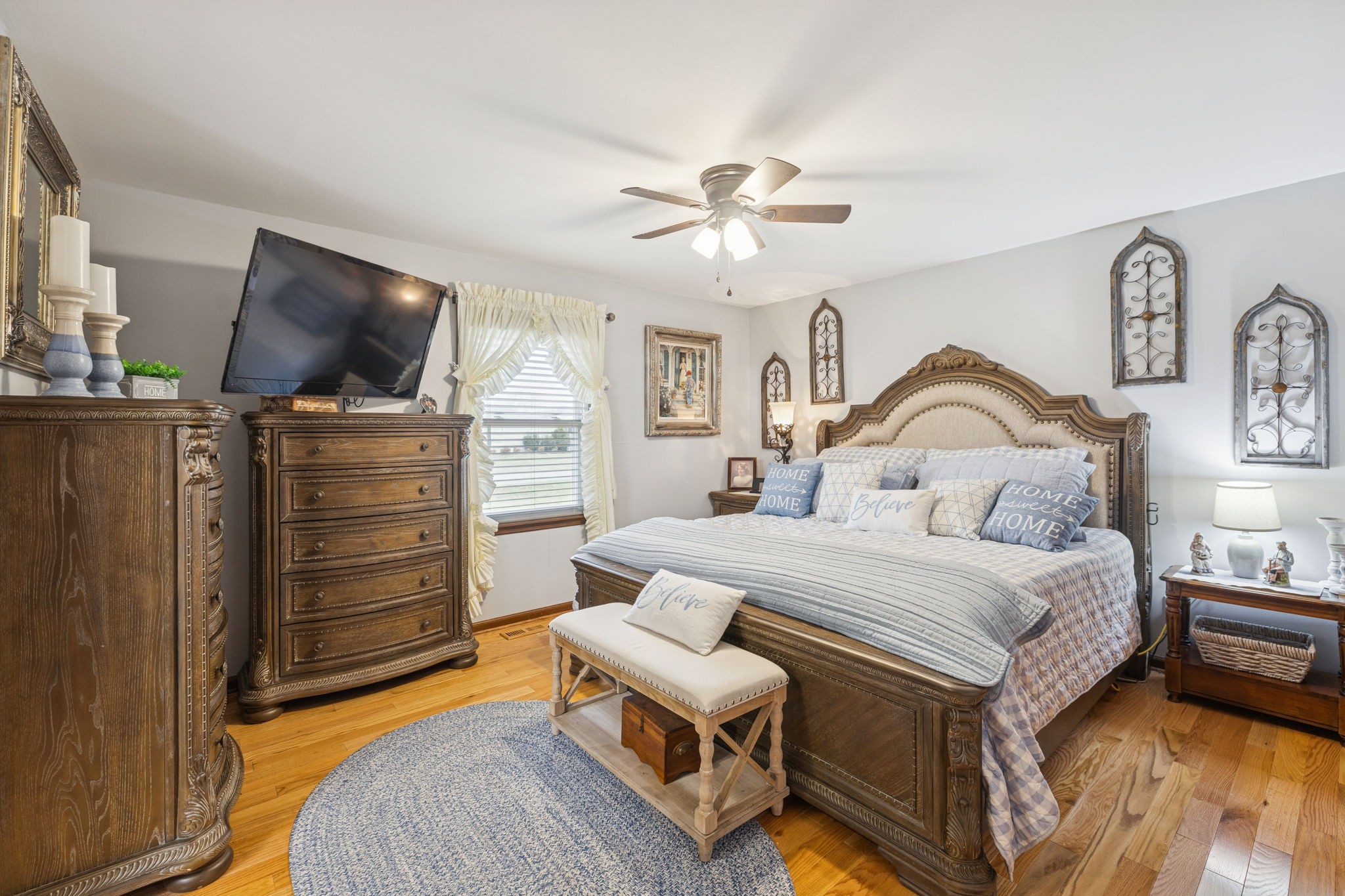 272 Belmar Circle Manchester, TN 37355 - Photo 17 of 56 a bedroom with a bed and a flat screen tv