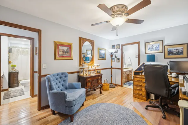 a bedroom with furniture and a window