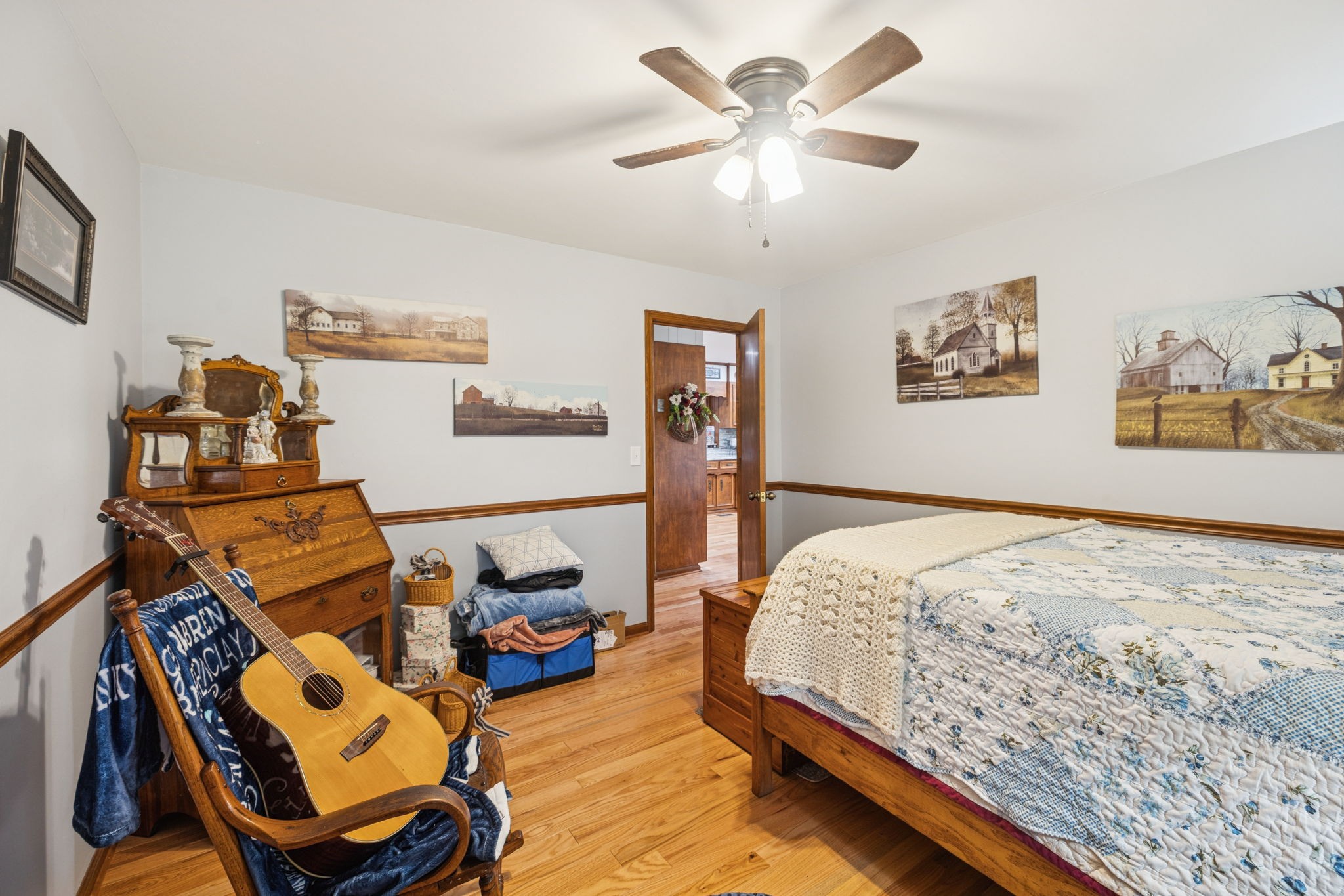 272 Belmar Circle Manchester, TN 37355 - Photo 24 of 56 a bedroom with a bed and wooden floor