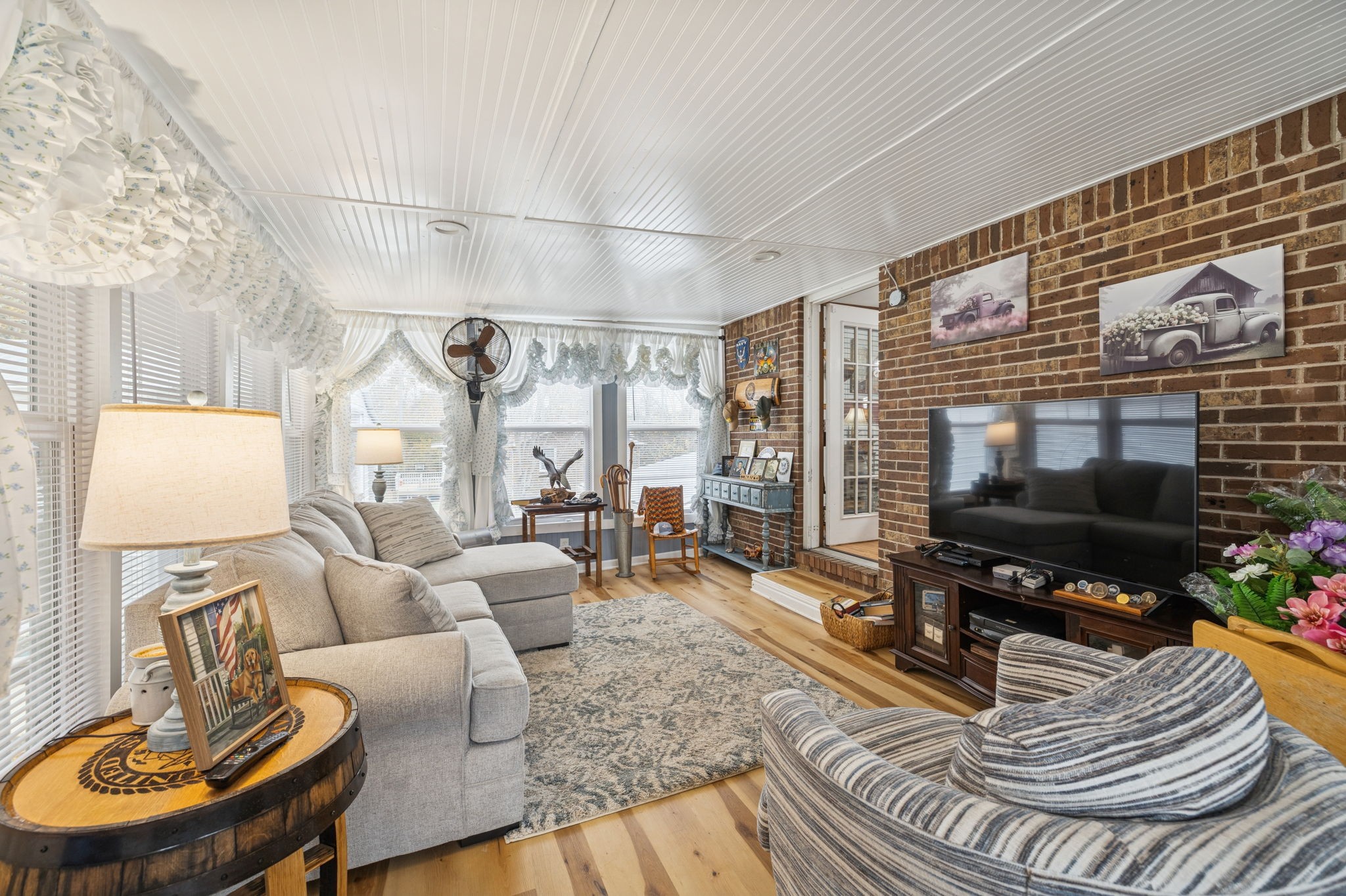 272 Belmar Circle Manchester, TN 37355 - Photo 27 of 56 a living room with furniture and a flat screen tv