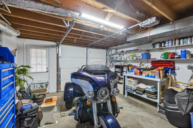 a view of a chairs and table in patio