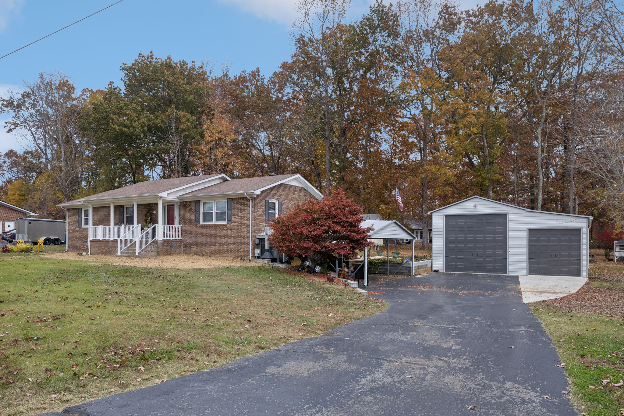 272 Belmar Circle Manchester, TN 37355 - Photo 4 of 56 a view of a house with a yard and large tree