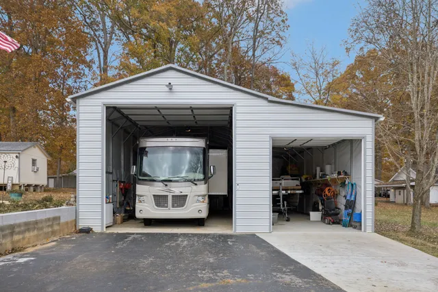 a view of two chairs in the row yard