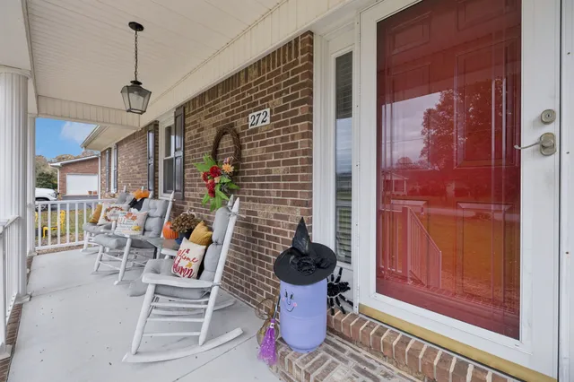 a kitchen with stainless steel appliances granite countertop a sink stove and wooden cabinets