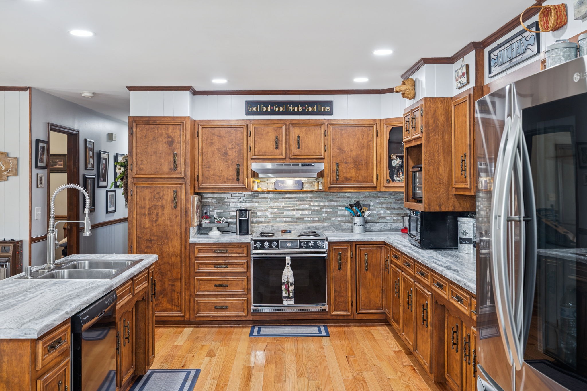 272 Belmar Circle Manchester, TN 37355 - Photo 8 of 56 a kitchen with a refrigerator sink and cabinets