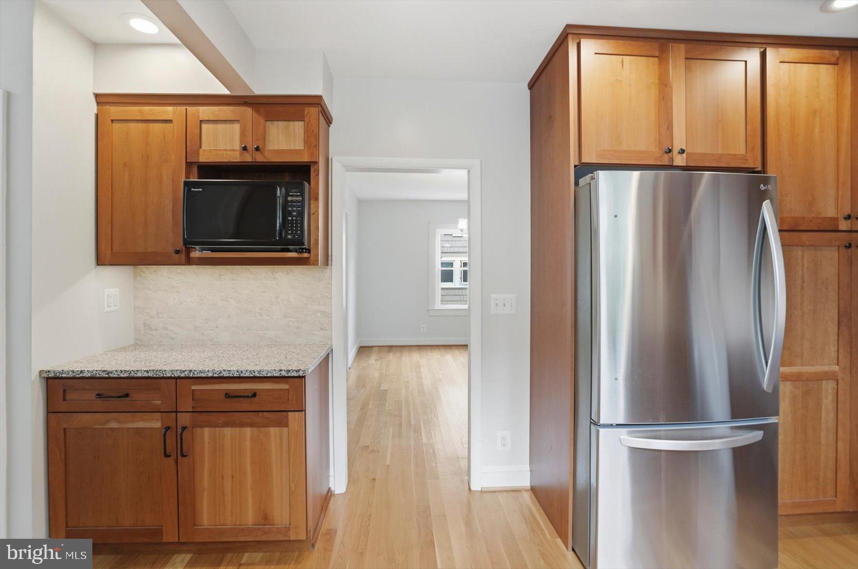24 Normal Terrace Baltimore, MD 21286 - Photo 14 of 37 a kitchen with stainless steel appliances granite countertop a refrigerator and a sink
