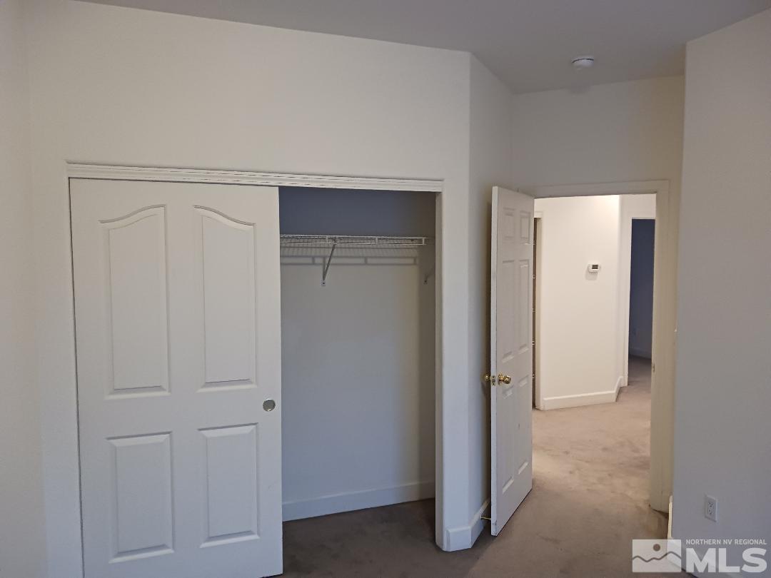 2217 Table Rock Drive Carson City, NV 89706 - Photo 17 of 28 an empty room with closet area