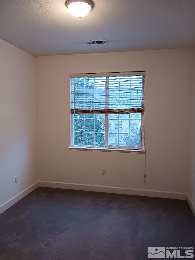 2217 Table Rock Drive Carson City, NV 89706 - Photo 18 of 28 an empty room with a window