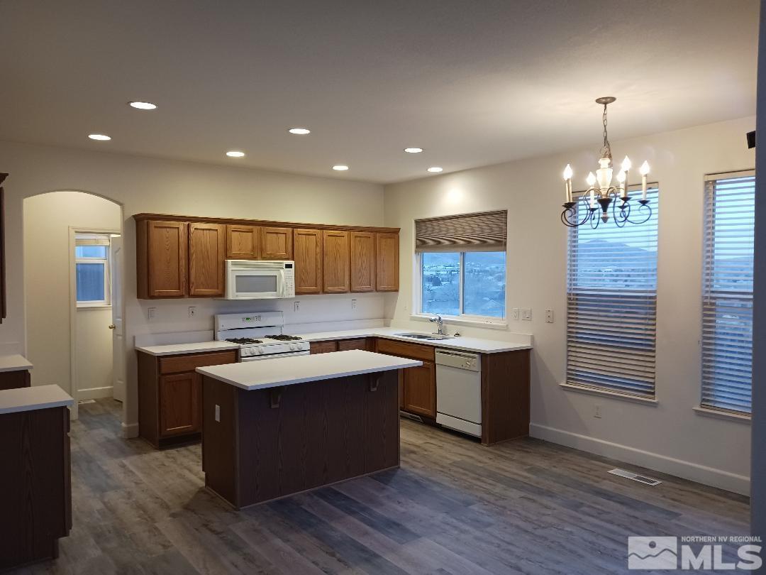 2217 Table Rock Drive Carson City, NV 89706 - Photo 5 of 28 a kitchen with a sink and stove top oven