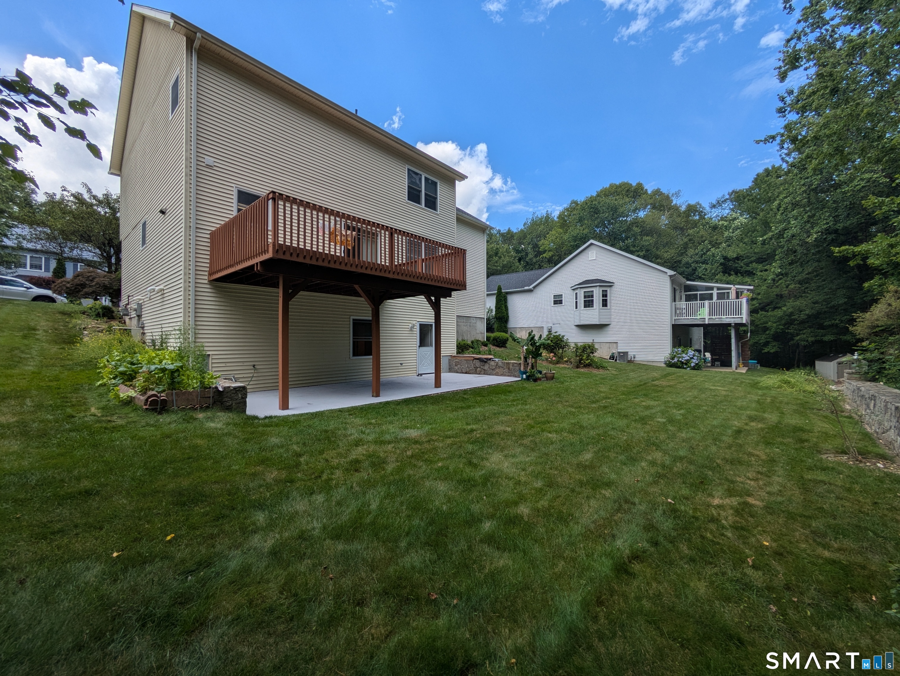 61 Basking Brook Road Shelton, CT 06484 - Photo 2 of 25 a house view with a garden space