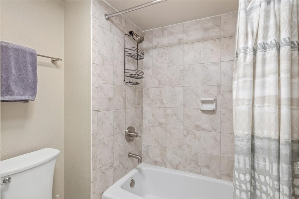 21650 Highway 6, Unit 2106 Keystone, CO 80435 - Photo 13 of 44 a bathroom with a shower and a toilet