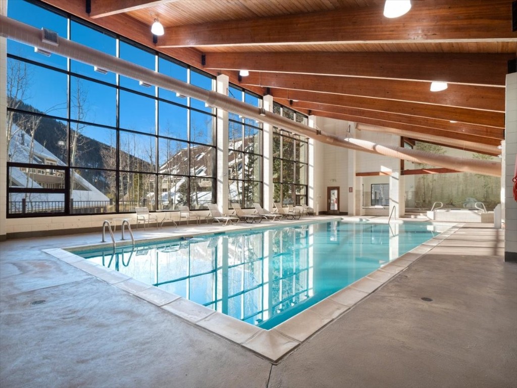 21650 Highway 6, Unit 2106 Keystone, CO 80435 - Photo 20 of 44 a view of a swimming pool with a porch