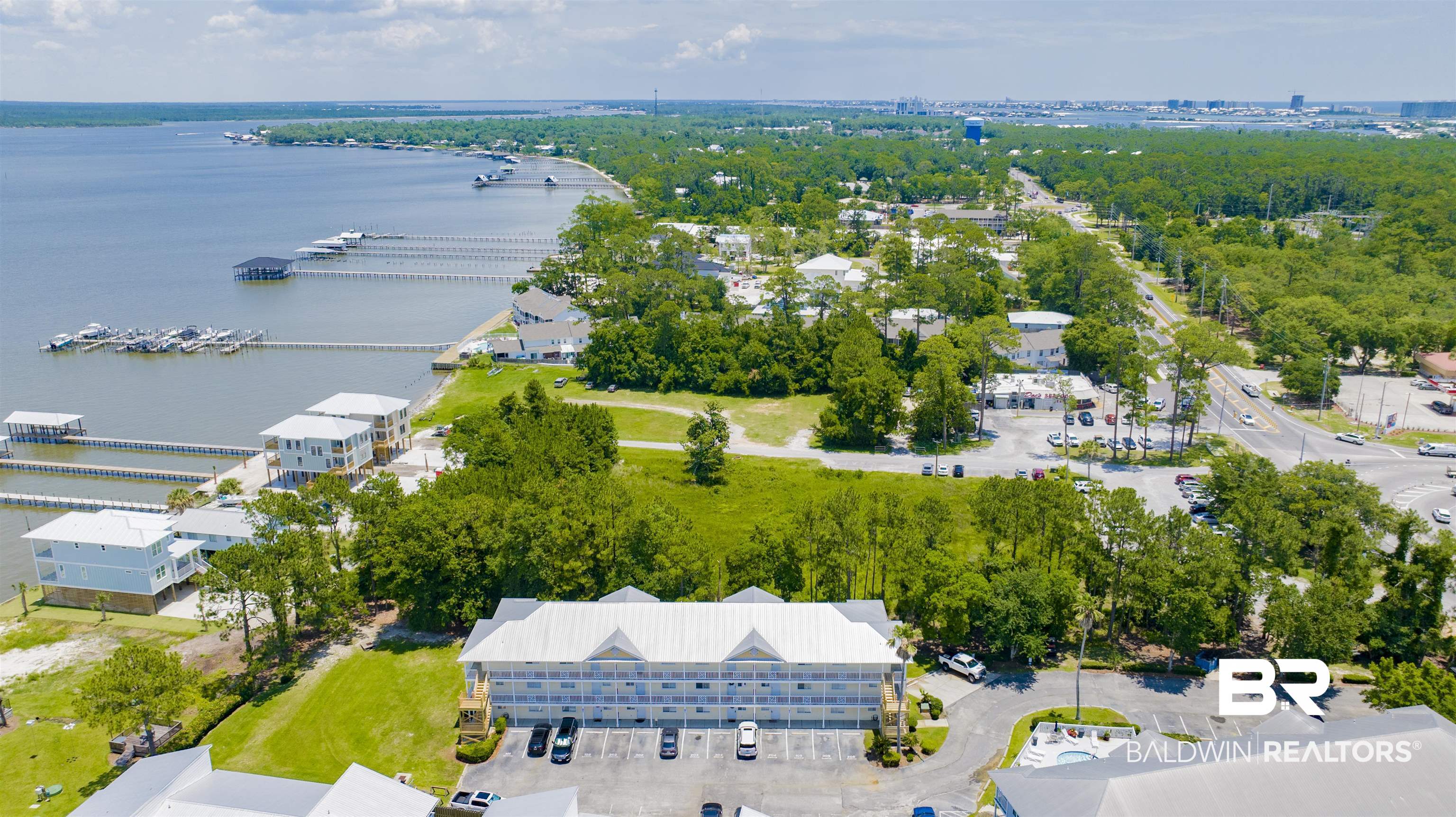 25957 Canal Road, Unit 203 Orange Beach, AL 36561 - Photo 23 of 28 Bird's eye view of a large body of water