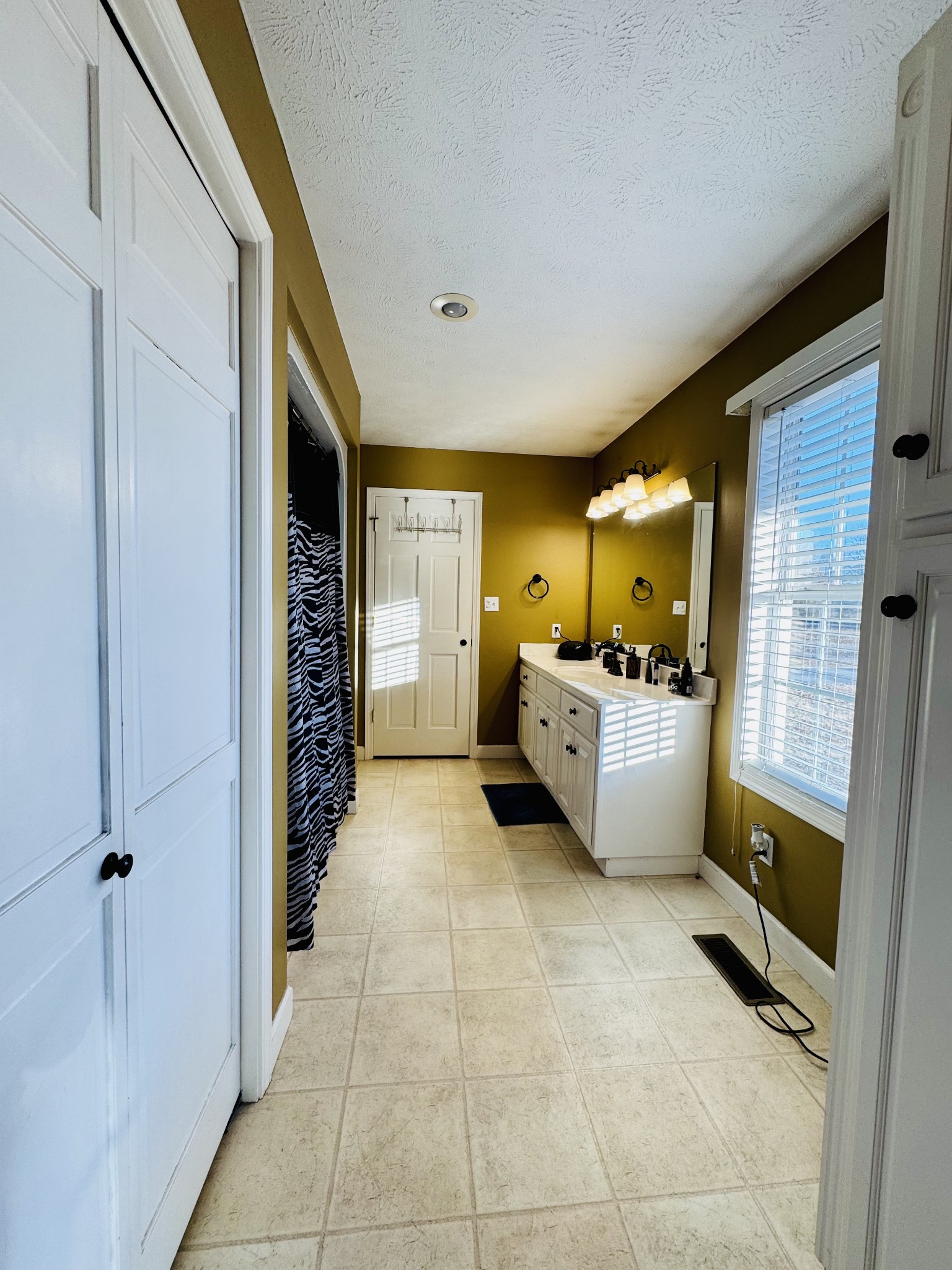 2235 Hagler Ridge Road Springville, TN 38256 - Photo 9 of 20 a view of living room kitchen and window