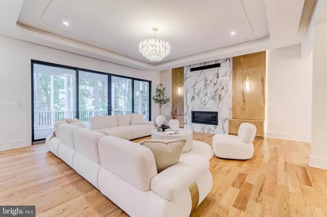 an empty room with wooden floor and closet