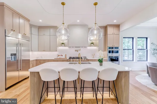 a kitchen with a stove and a shower