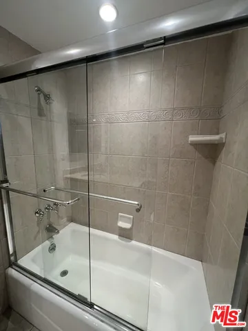 a view of room with hardwood floor