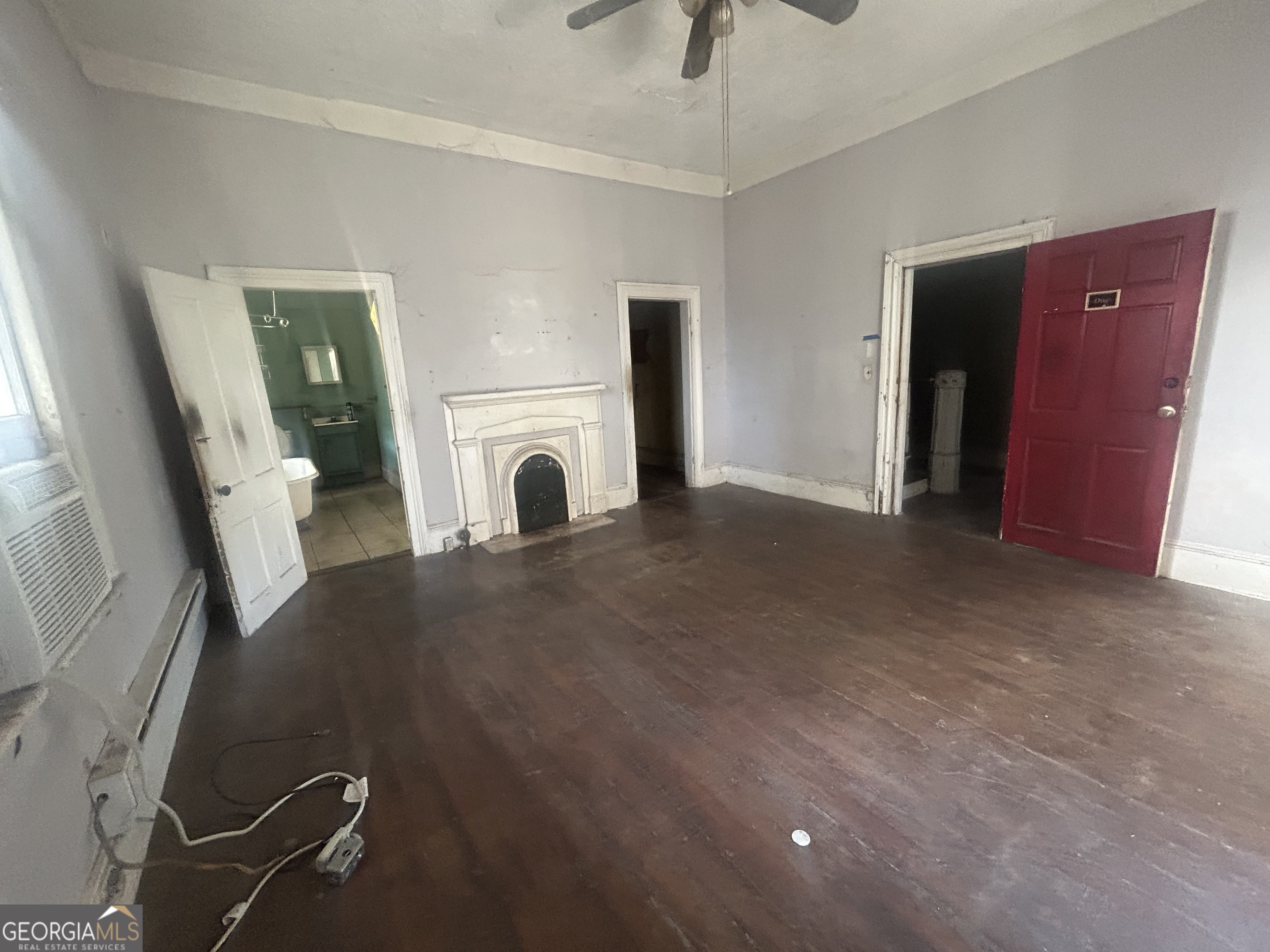 508 Albemarle Street, Unit AD Brunswick, GA 31520 - Photo 23 of 45 a view of a livingroom with furniture and a fireplace