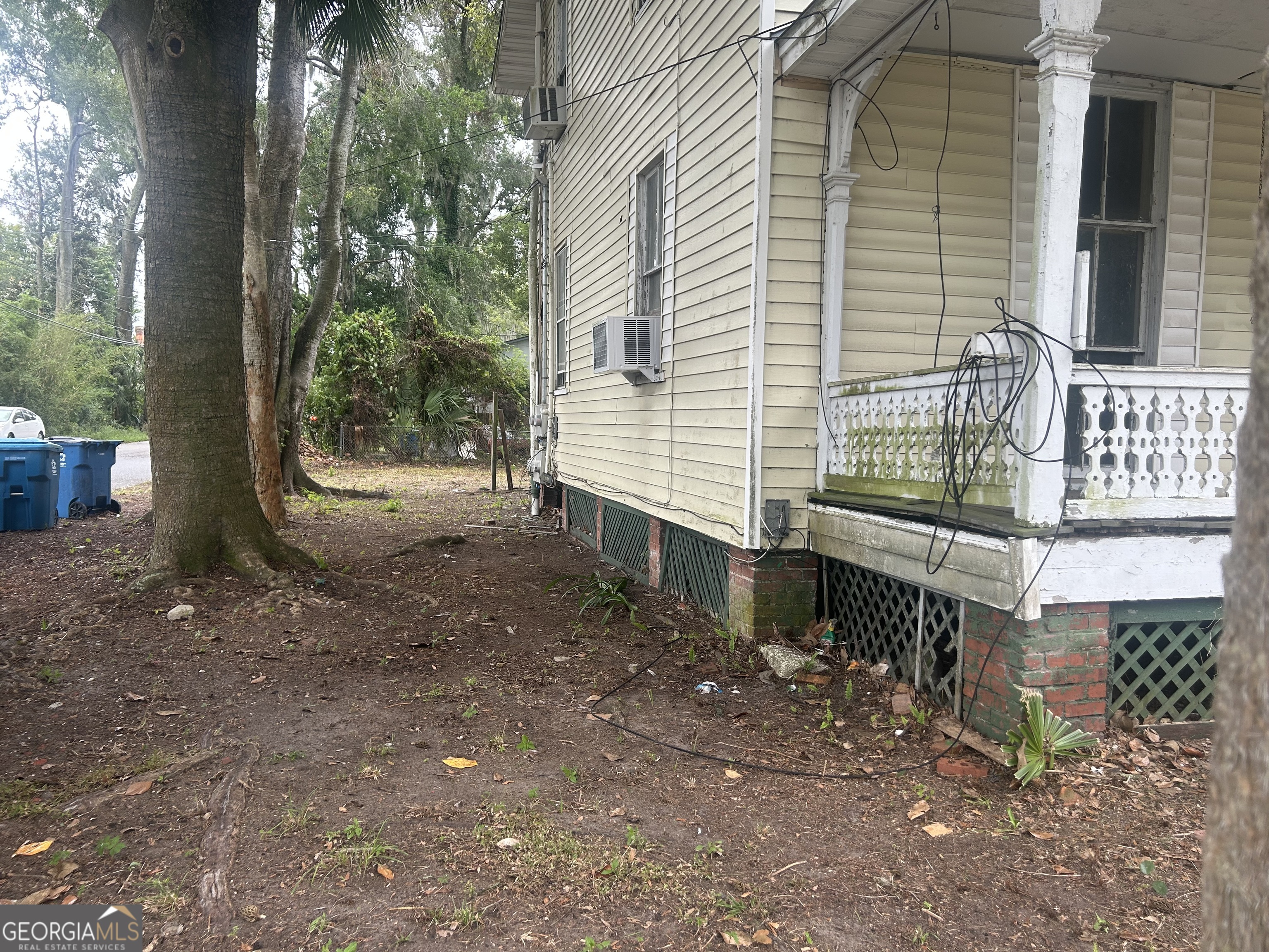 508 Albemarle Street, Unit AD Brunswick, GA 31520 - Photo 3 of 45 a view of a house with a yard and sitting area