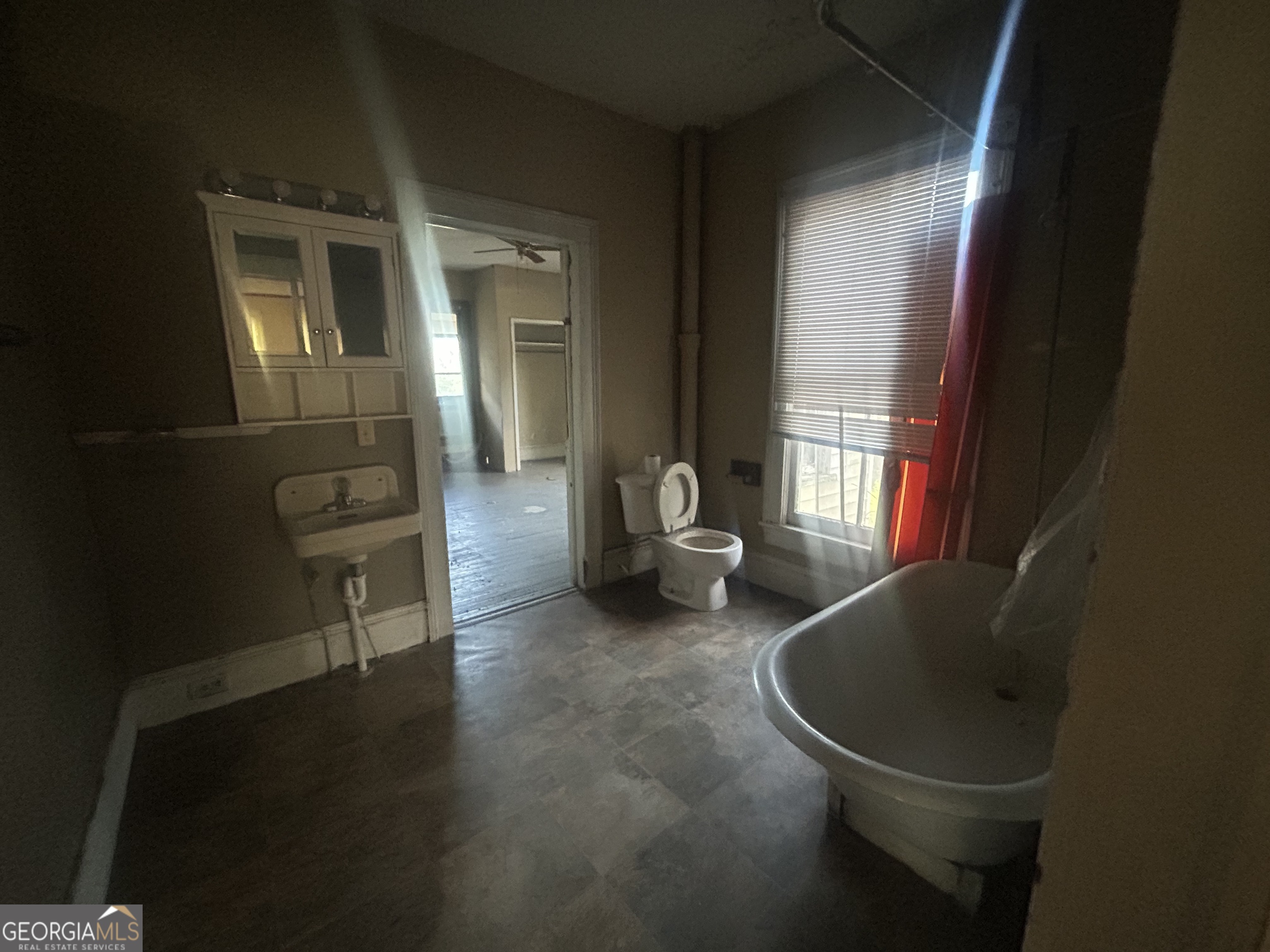 508 Albemarle Street, Unit AD Brunswick, GA 31520 - Photo 32 of 45 a living room with furniture and a window