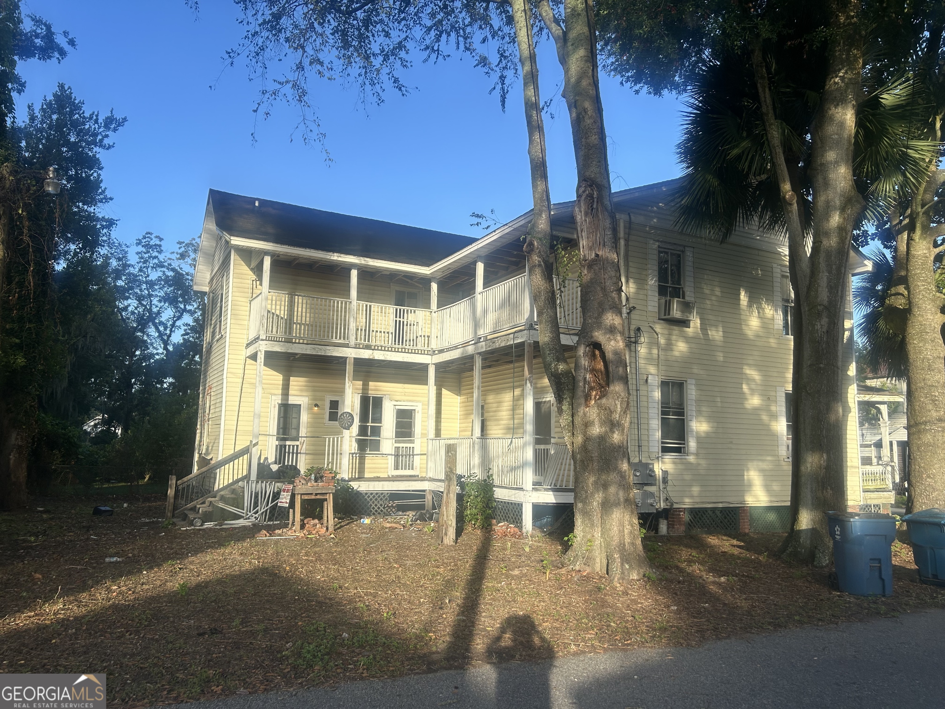 508 Albemarle Street, Unit AD Brunswick, GA 31520 - Photo 42 of 45 a view of a building with a glass door