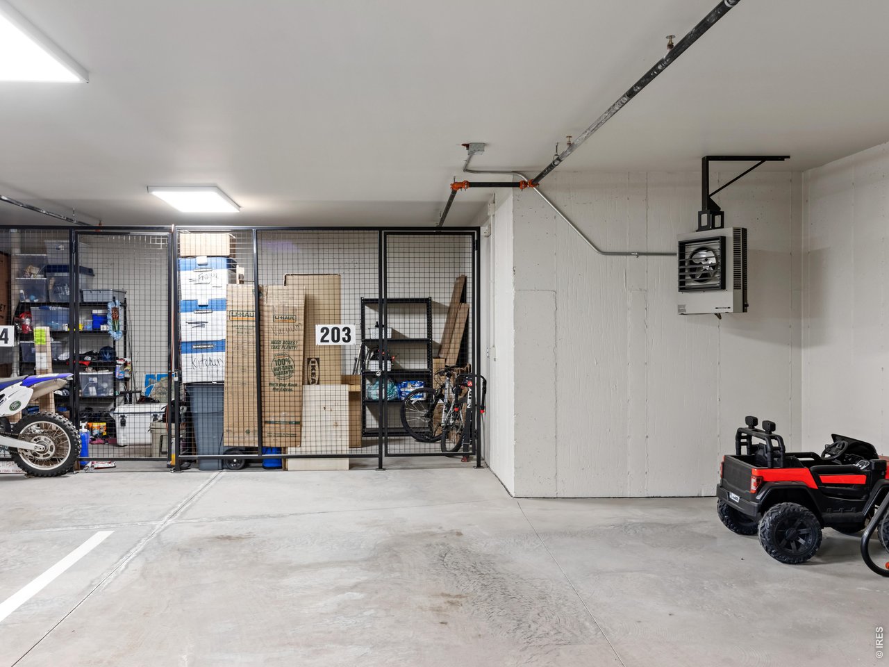 1836 Wildfire Road, Unit 203 Estes Park, CO 80517 - Photo 27 of 30 Dedicated indoor parking and secure storage unit