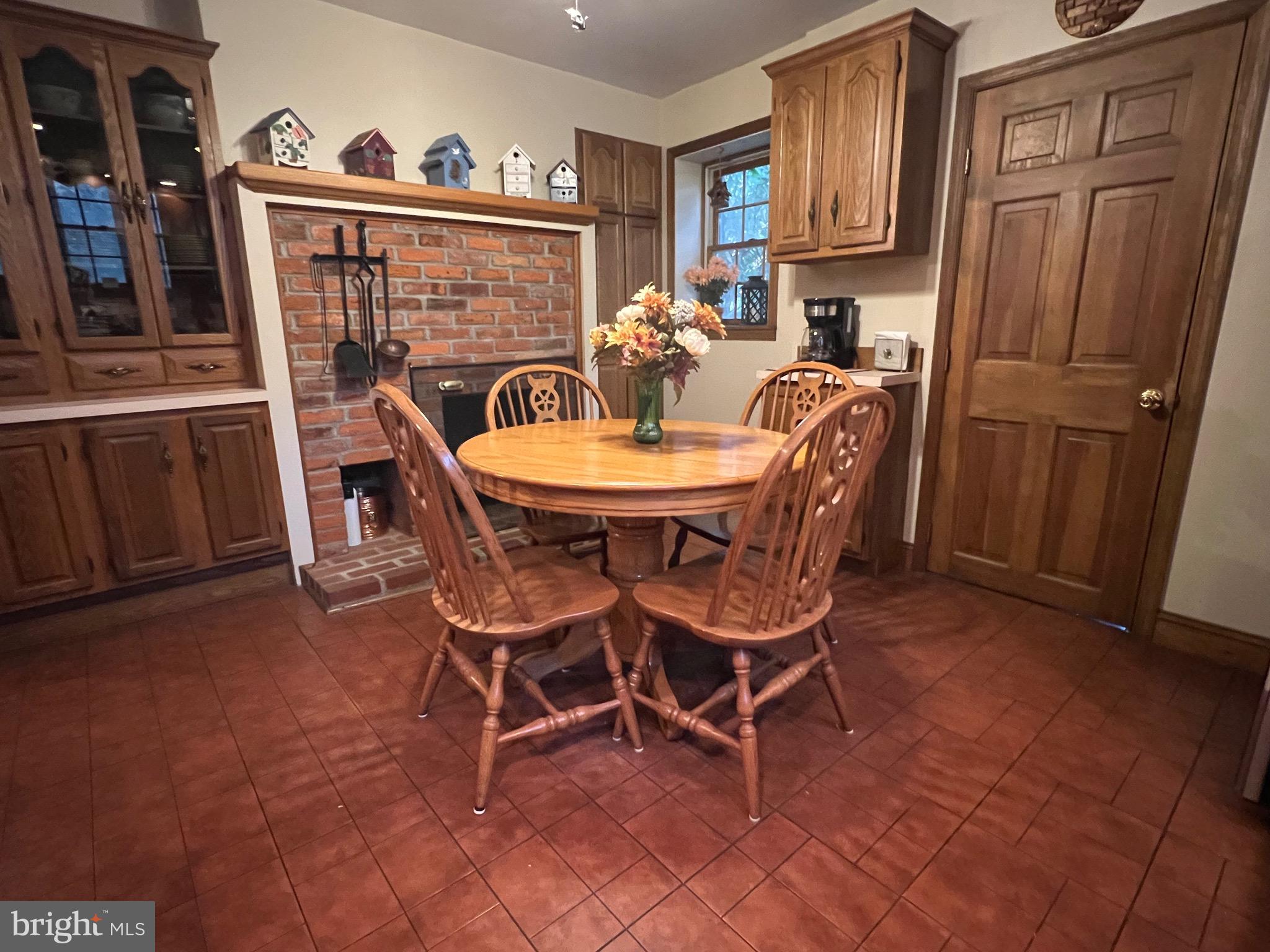 424 Jennings Street Beverly, NJ 08010 - Photo 11 of 43 a dining room with furniture and wooden floor