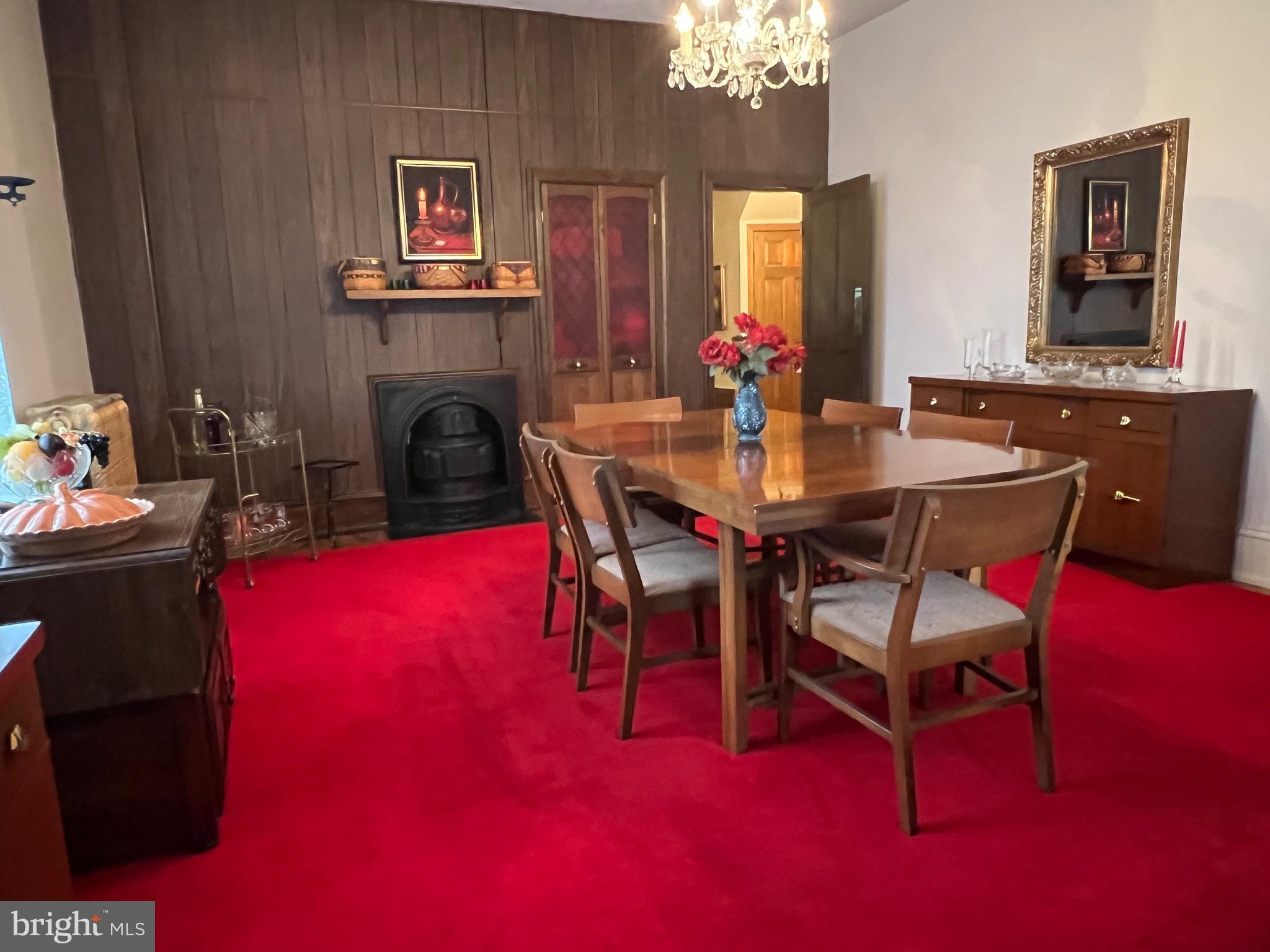 424 Jennings Street Beverly, NJ 08010 - Photo 14 of 43 a view of a dining room with furniture and chandelier