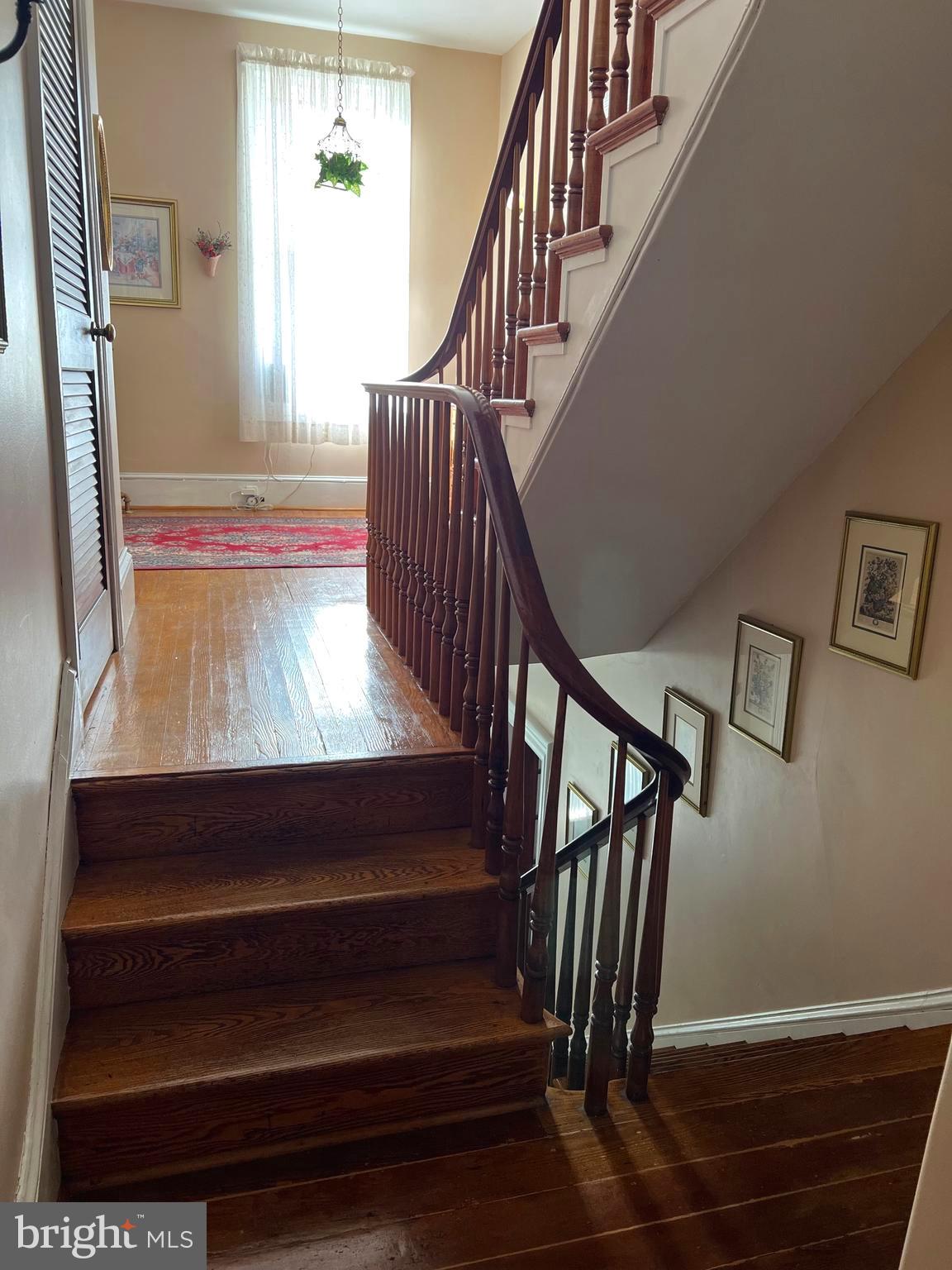 424 Jennings Street Beverly, NJ 08010 - Photo 19 of 43 a view of entryway and hall with wooden floor