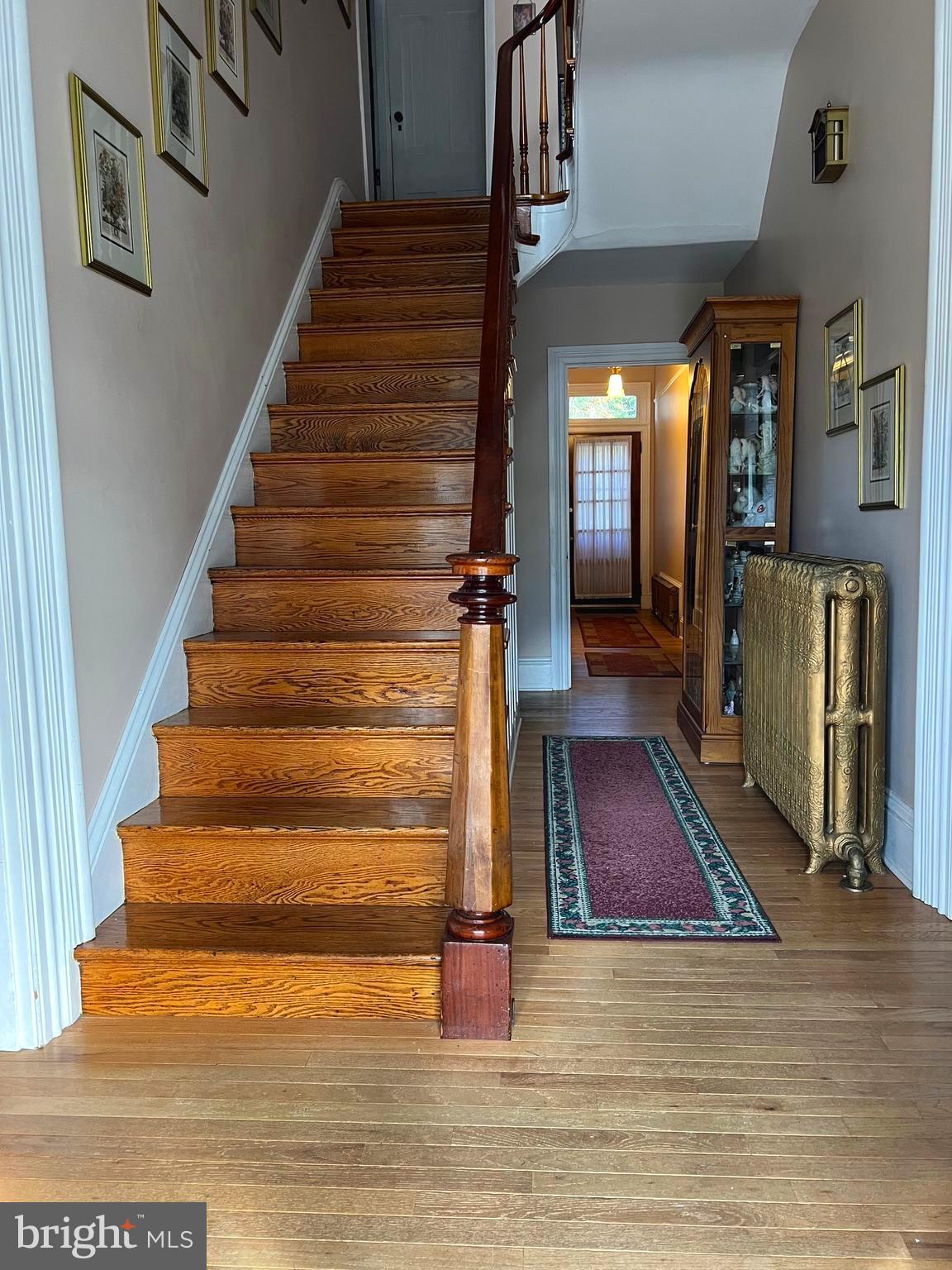424 Jennings Street Beverly, NJ 08010 - Photo 5 of 43 a view of entryway and hall with wooden floor